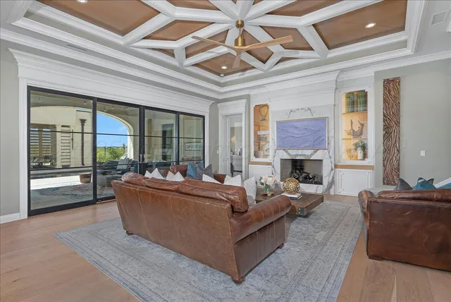 a view of a room with a table and chairs