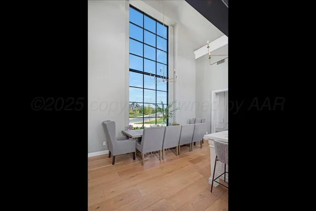 an aerial view of a house with a garden