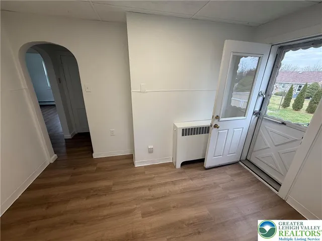 a view of front door door with stairs