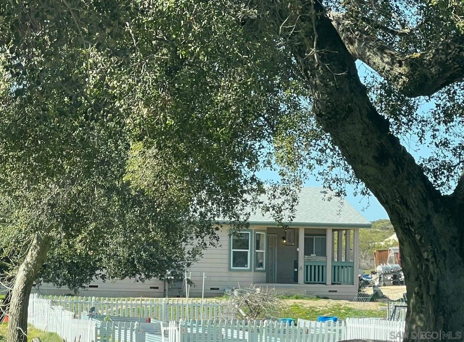 1122 Tierra Del Sol Road Boulevard, CA 91905 - Photo 1 of 26 front view of a house with a tree