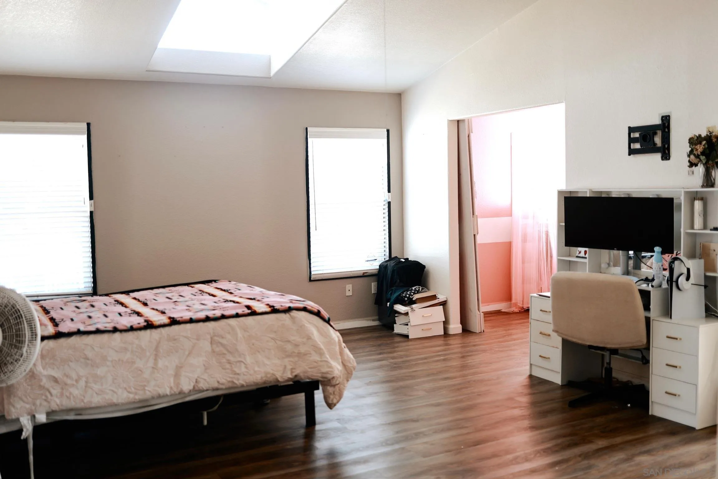 1122 Tierra Del Sol Road Boulevard, CA 91905 - Photo 10 of 26 a bedroom with a bed and a flat screen tv