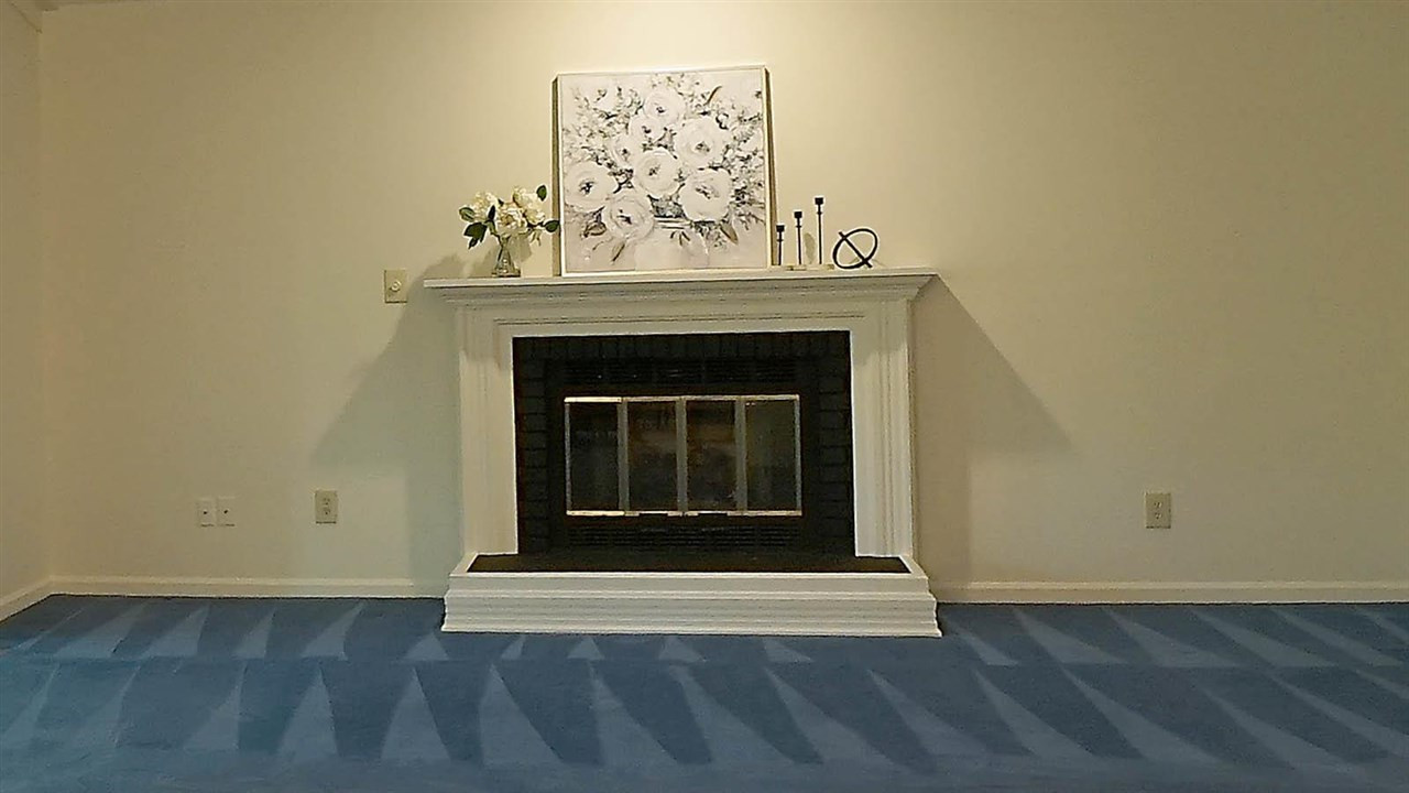 2801 Rue Sans Famille Raleigh, NC 27607 - Photo 4 of 26 Remodeled gas fireplace with new gas logs, shutoff and gas line. Ready to curl up around in the cold winters. Cozy gas fireplace