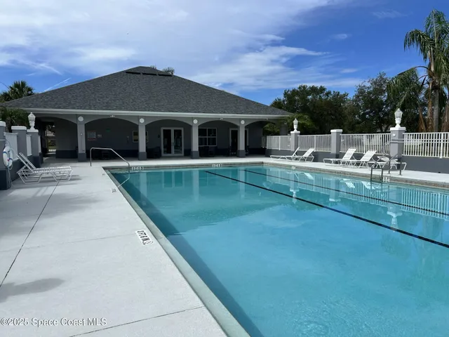 a front view of a house with swimming pool