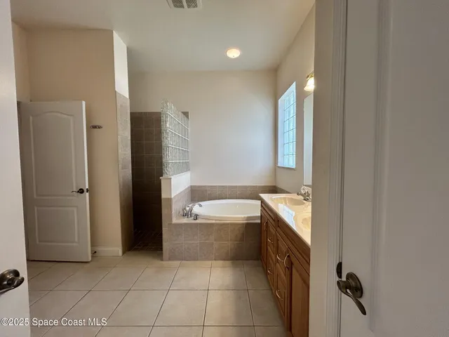 a bathroom with a bathtub sink and toilet