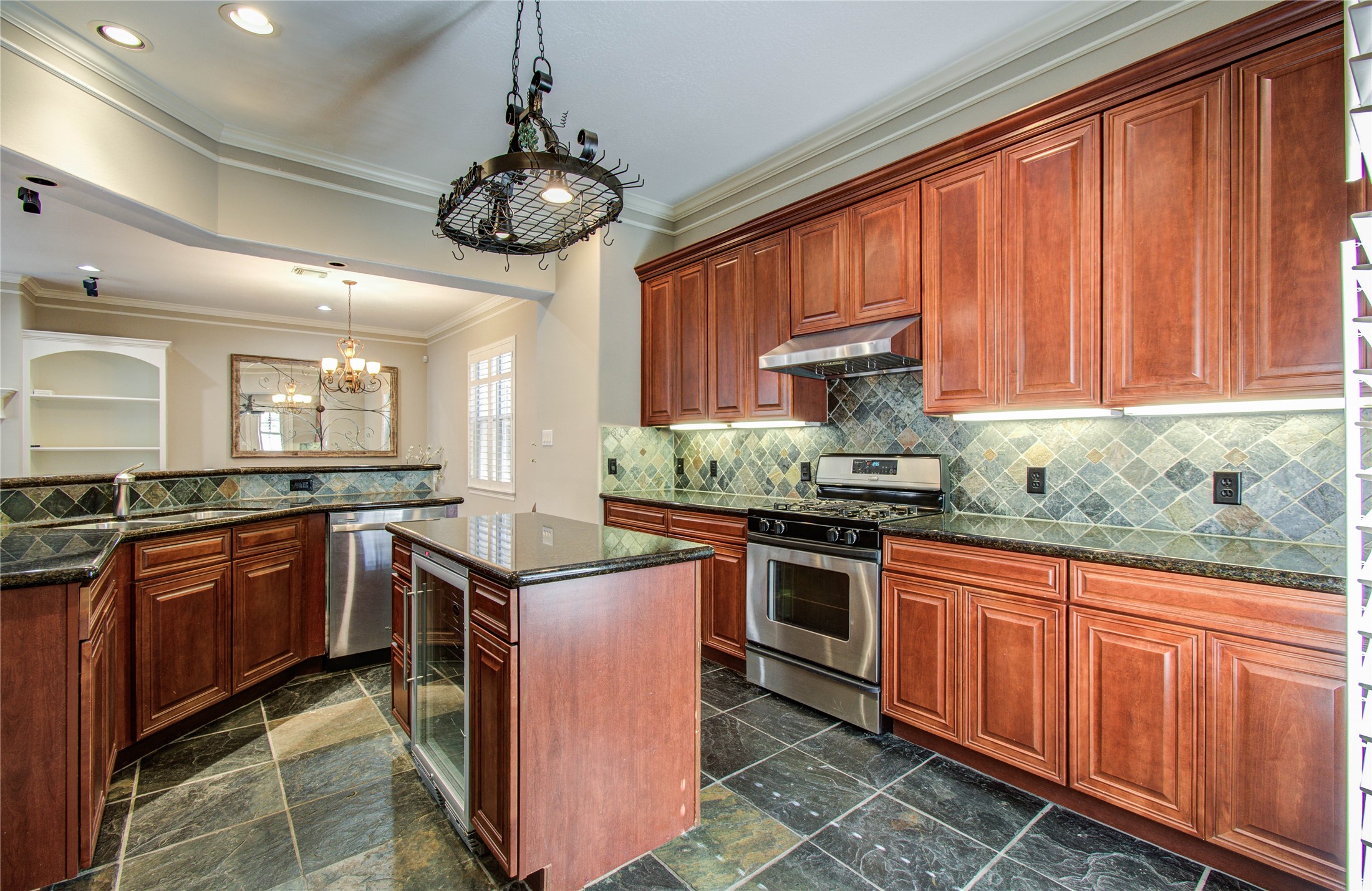 4613 Floyd Street Houston, TX 77007 - Photo 11 of 37 a kitchen with stainless steel appliances granite countertop cabinets and a sink
