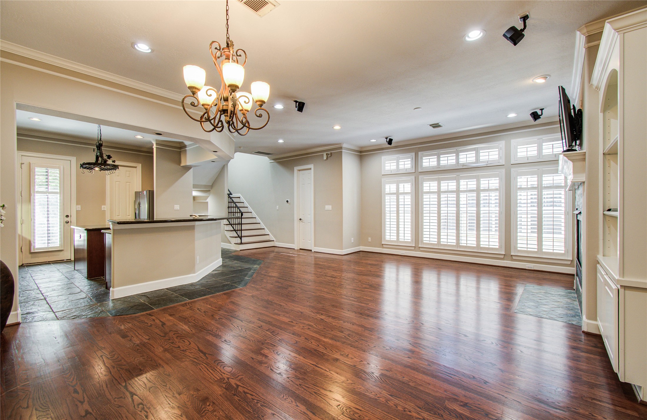 4613 Floyd Street Houston, TX 77007 - Photo 16 of 37 a view of a room with wooden floor and windows