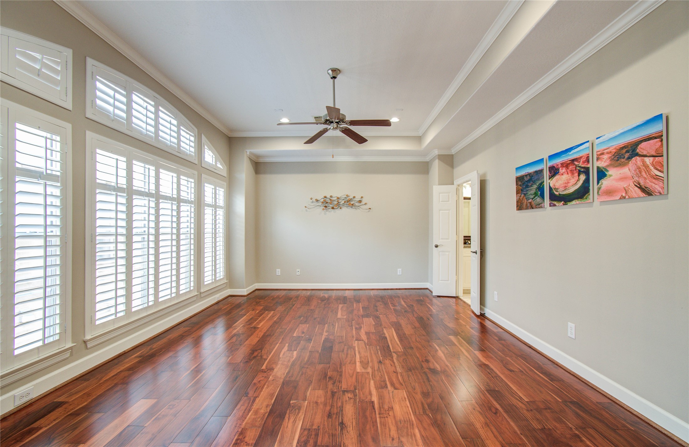 4613 Floyd Street Houston, TX 77007 - Photo 24 of 37 wooden floor in an empty room with a window
