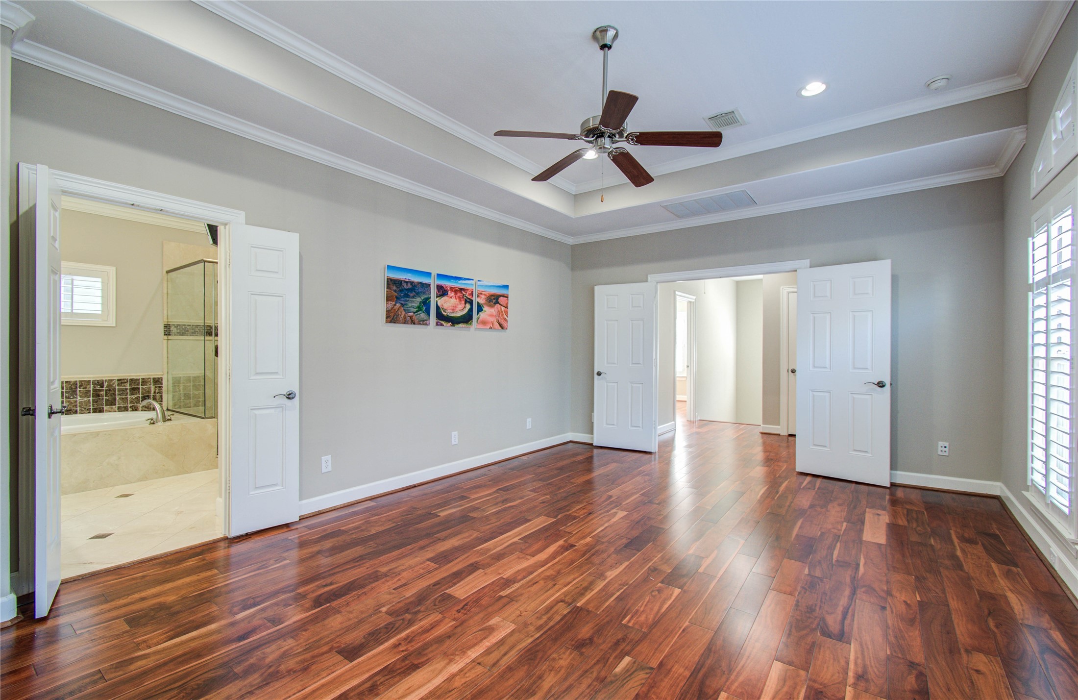 4613 Floyd Street Houston, TX 77007 - Photo 25 of 37 a view of an empty room with wooden floor and a window