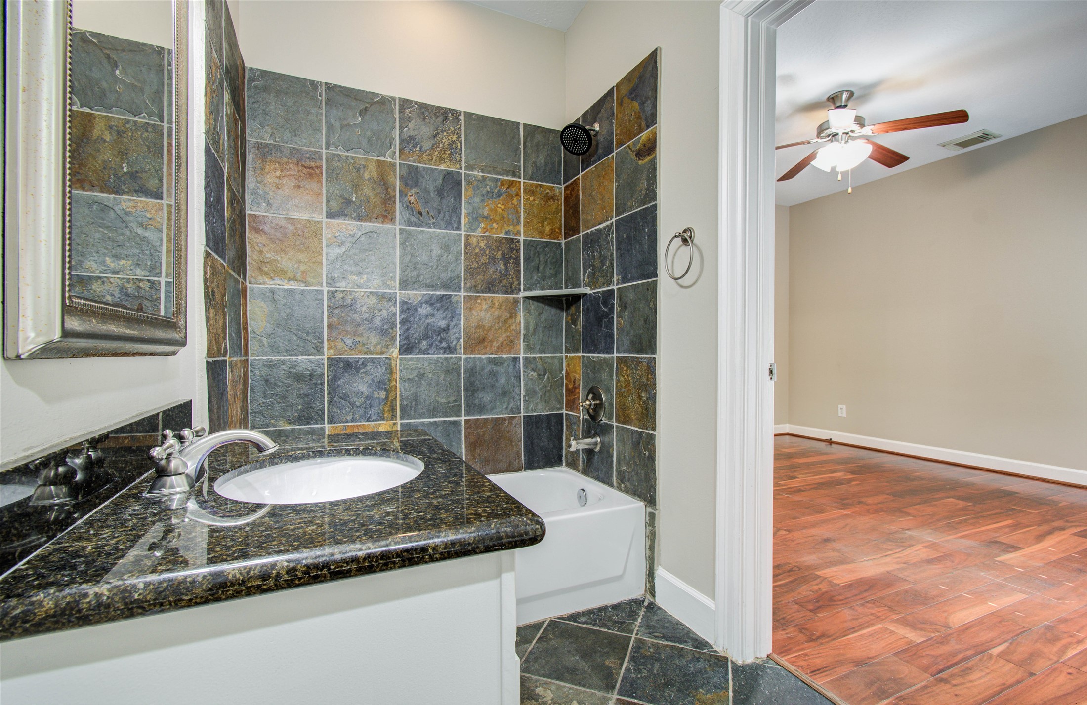 4613 Floyd Street Houston, TX 77007 - Photo 33 of 37 a bathroom with a sink and a mirror