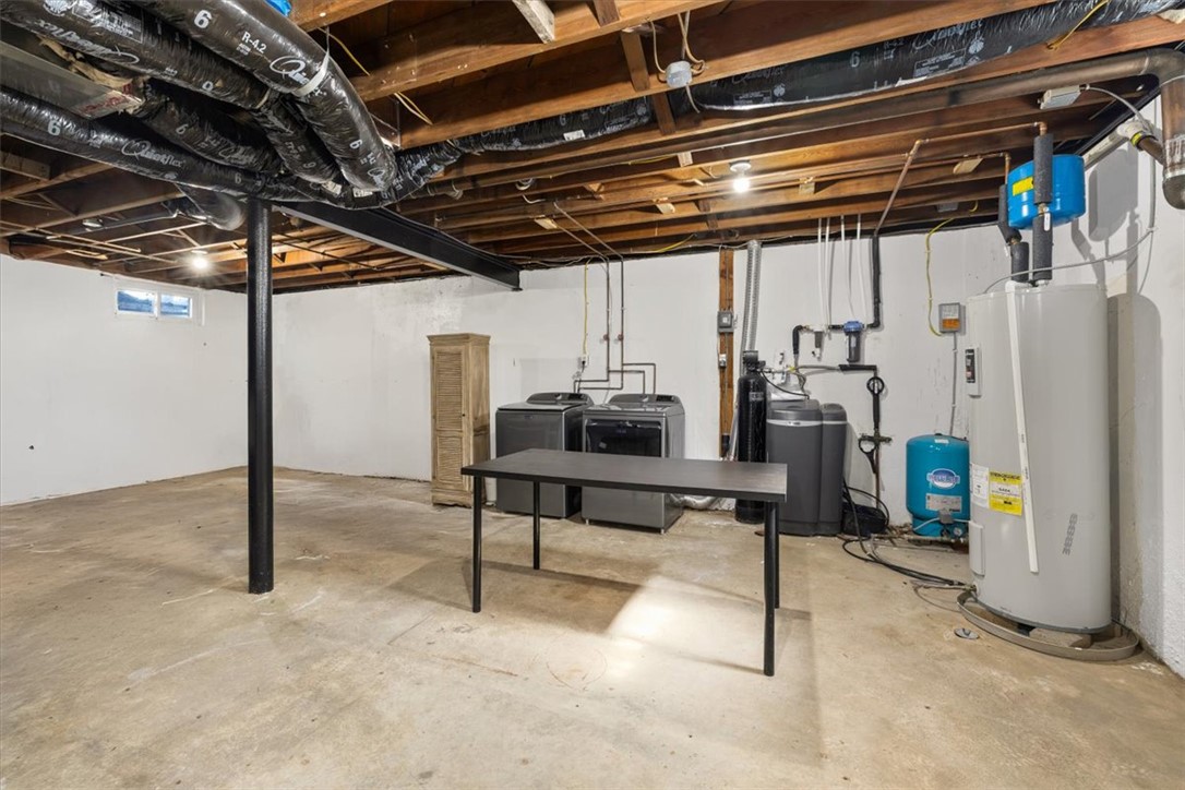 9555 Clyo Road Dayton, OH 45458 - Photo 26 of 31 This versatile basement offers ample space for various uses, featuring a dedicated laundry area.