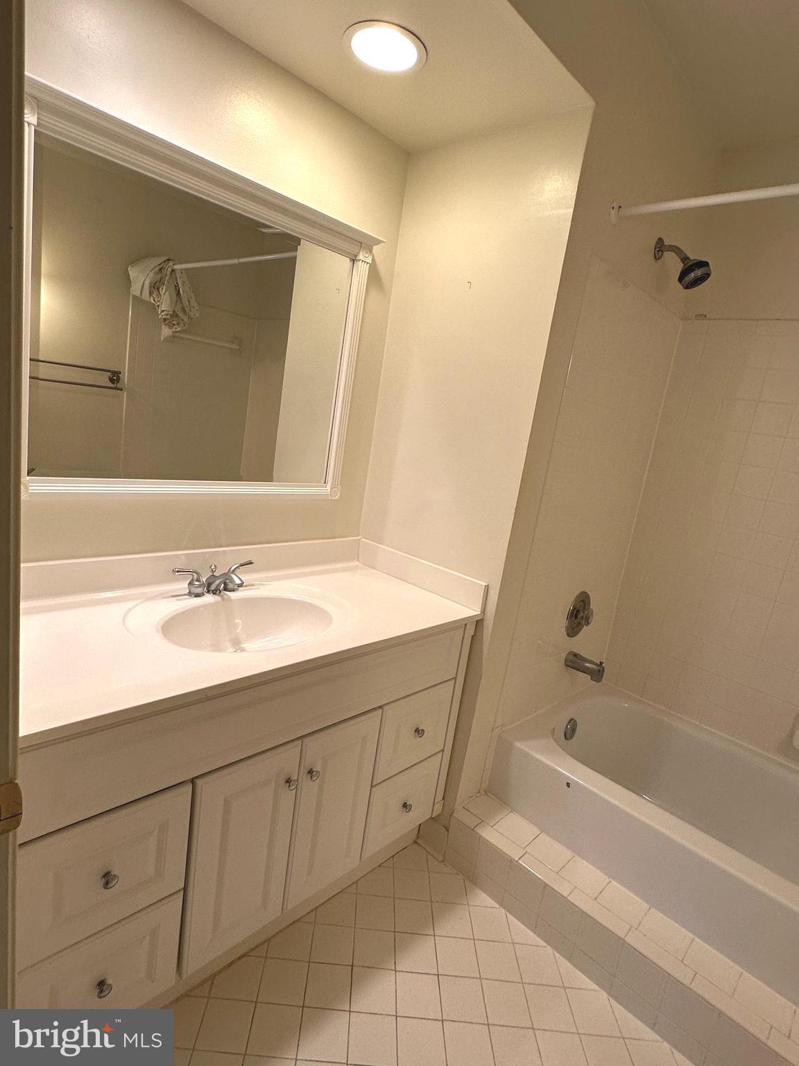 7808 Spinnaker Road, Unit 12 Laurel, MD 20707 - Photo 13 of 23 a bathroom with a sink double vanity and a mirror