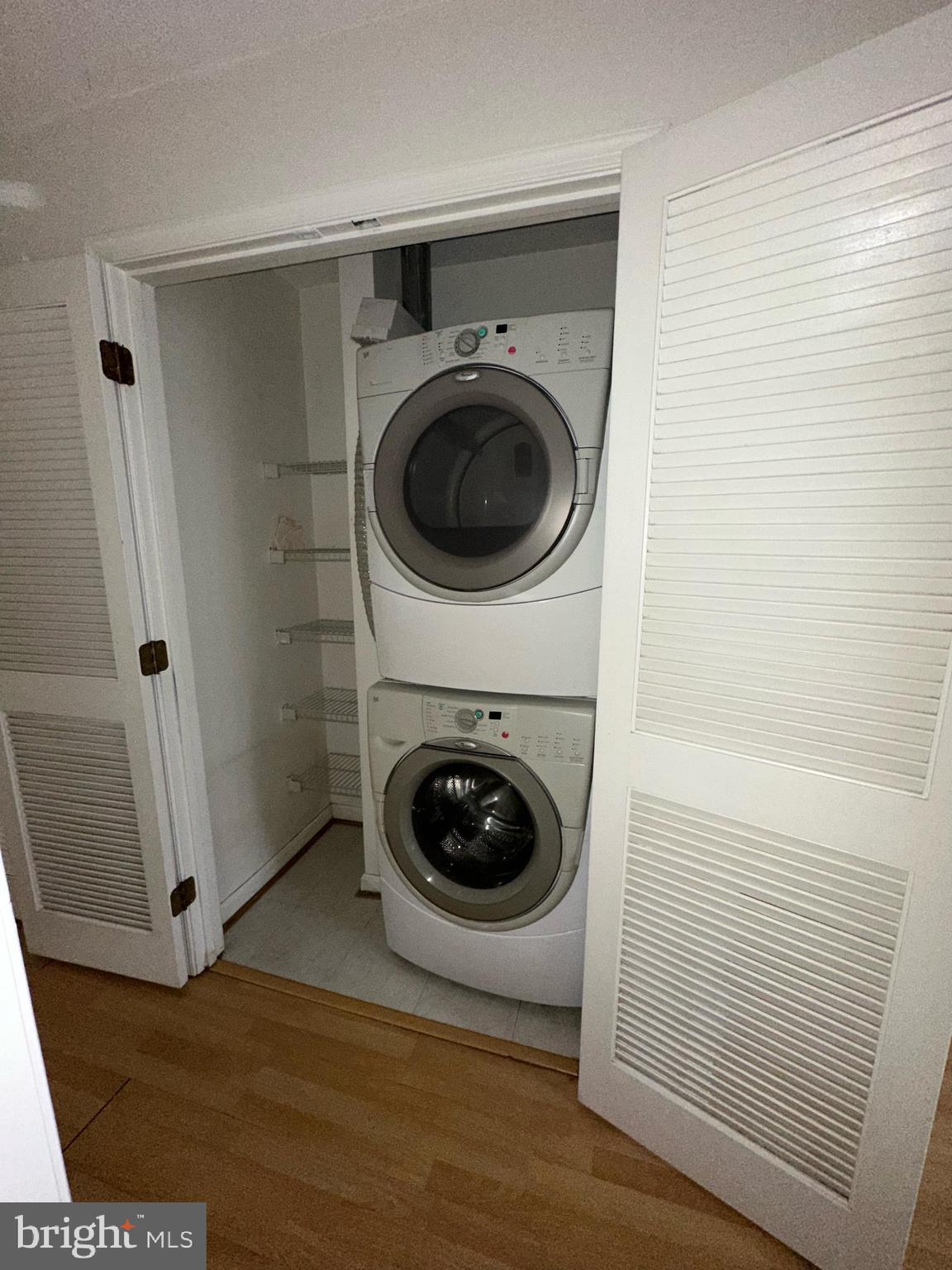 7808 Spinnaker Road, Unit 12 Laurel, MD 20707 - Photo 20 of 23 a utility room with dryer and washer