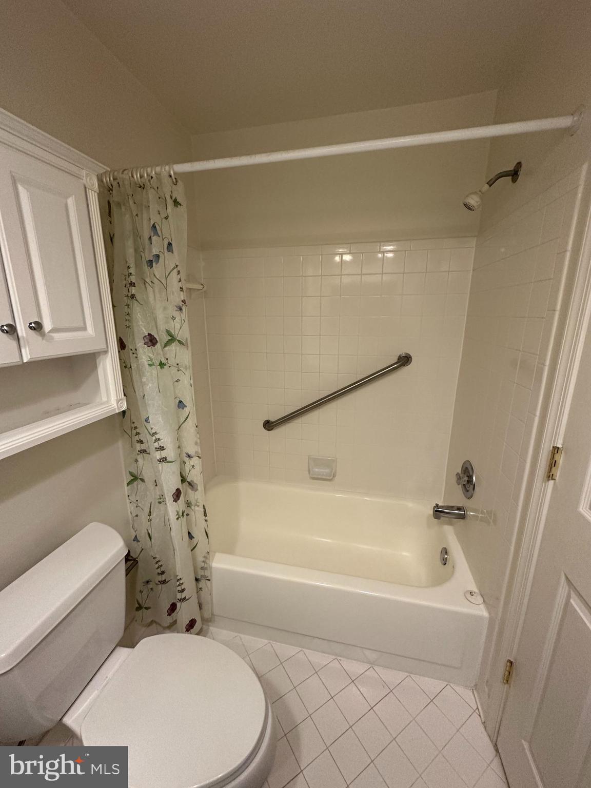 7808 Spinnaker Road, Unit 12 Laurel, MD 20707 - Photo 21 of 23 a bathroom with a toilet and a shower
