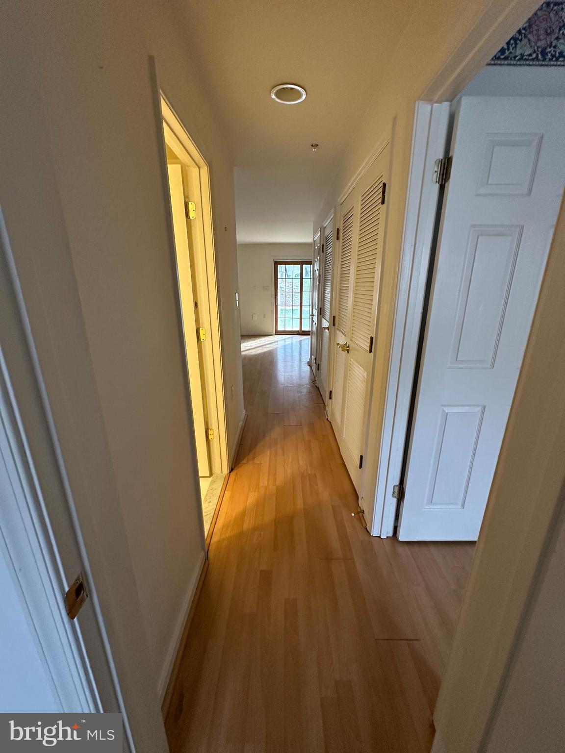 7808 Spinnaker Road, Unit 12 Laurel, MD 20707 - Photo 23 of 23 a view of hallway with furniture and wooden floor