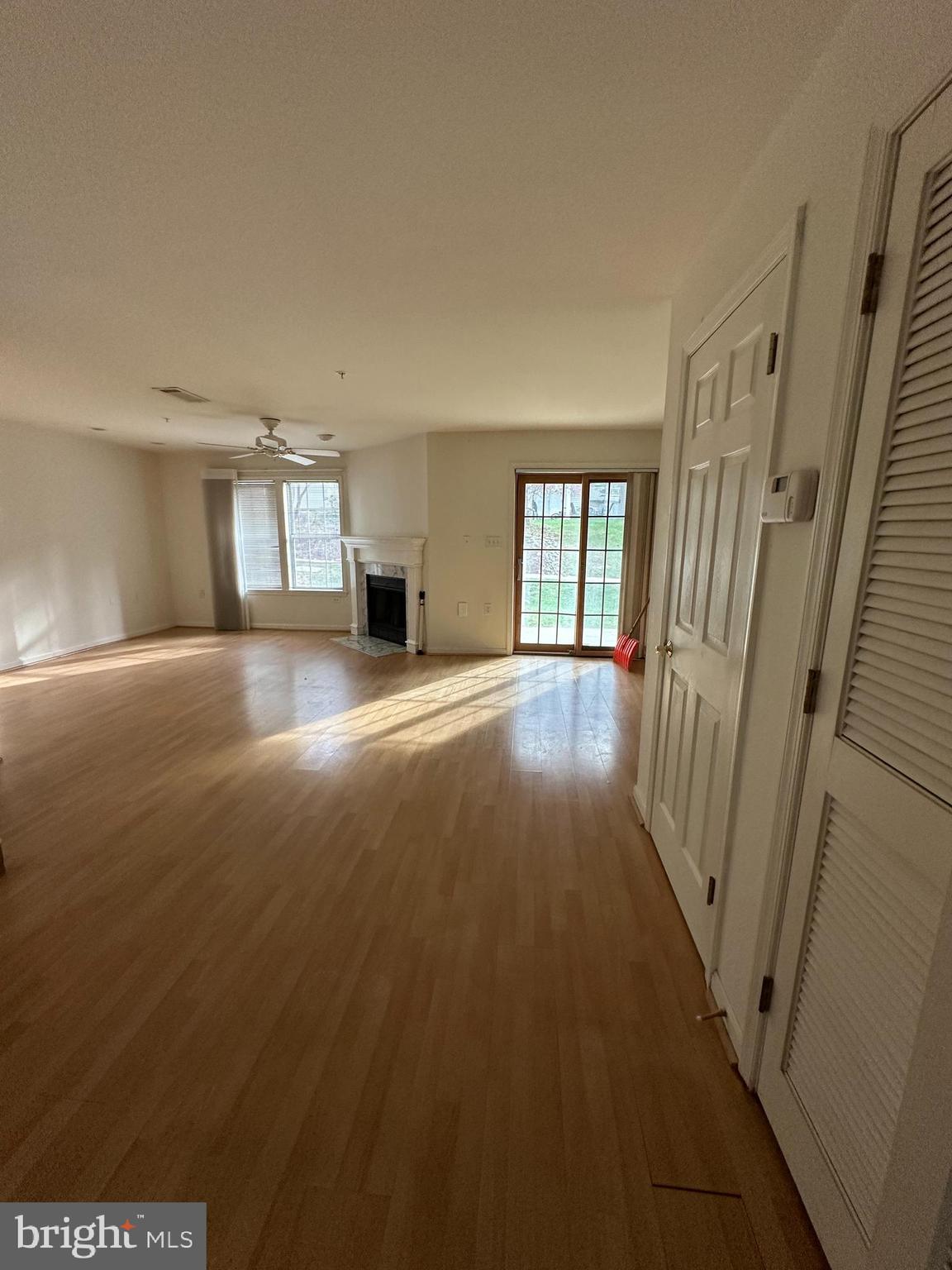 7808 Spinnaker Road, Unit 12 Laurel, MD 20707 - Photo 9 of 23 a view of a livingroom with a fireplace