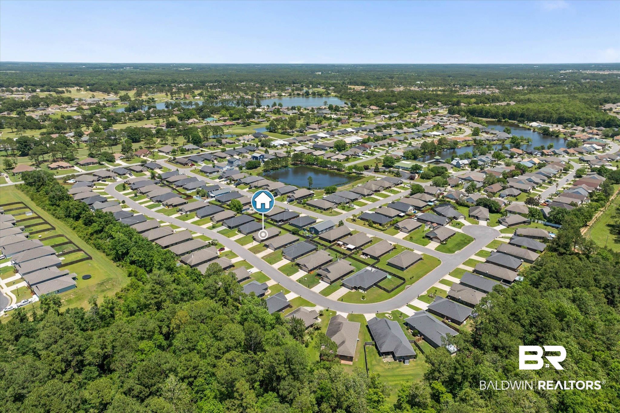 22420 Respite Lane Foley, AL 36535 - Photo 29 of 35 Residential development featuring a network of streets, uniform rooflines, and multiple water features