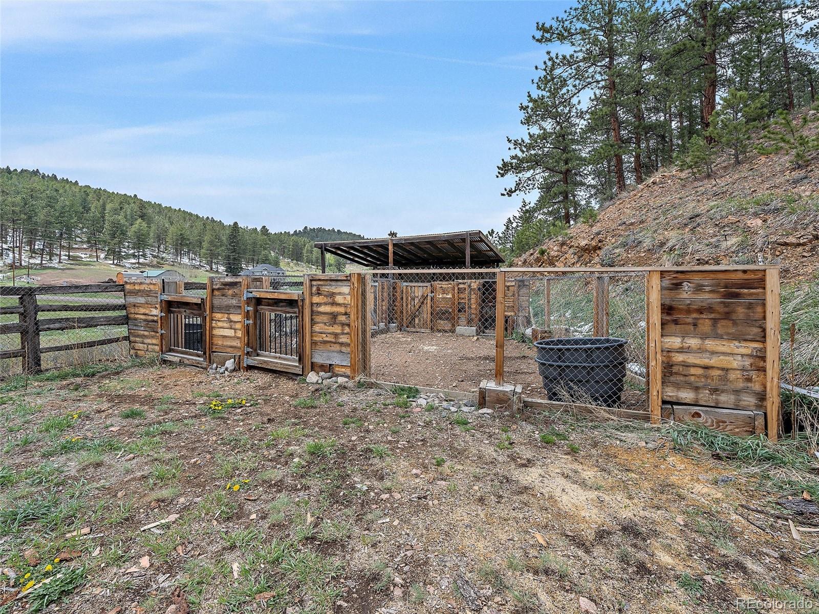 24293 Running Deer Road Conifer, CO 80433 - Photo 29 of 33 a view of a backyard