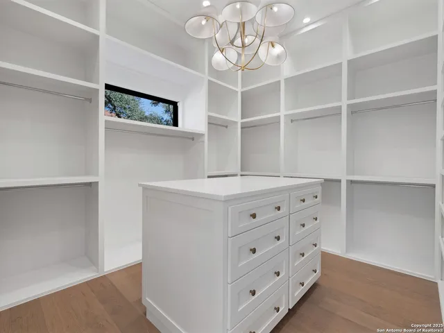 a view of an empty walk in closet