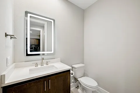 a bathroom with a sink a bathtub and shower