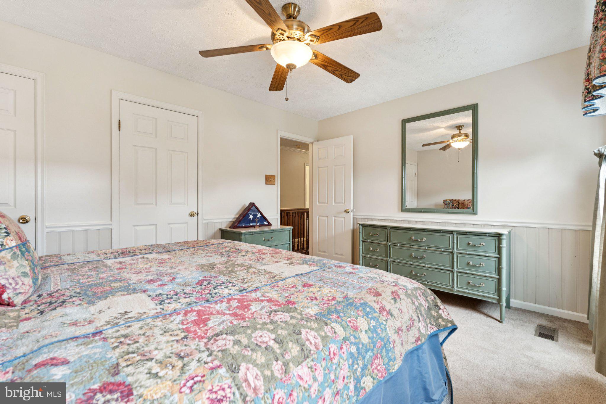 817 Peppard Drive Bel Air, MD 21014 - Photo 24 of 49 a bedroom with a bed and a dresser