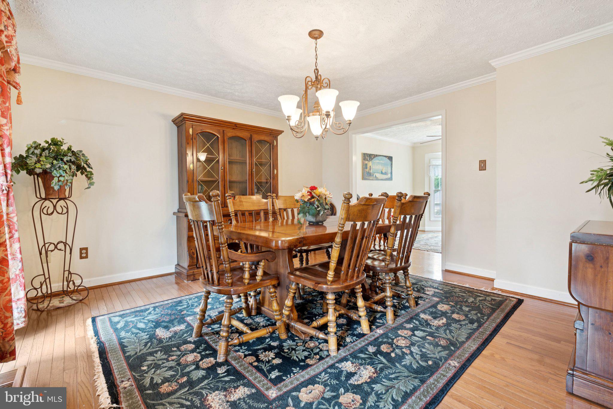 817 Peppard Drive Bel Air, MD 21014 - Photo 3 of 49 a view of a dining room with furniture and wooden floor