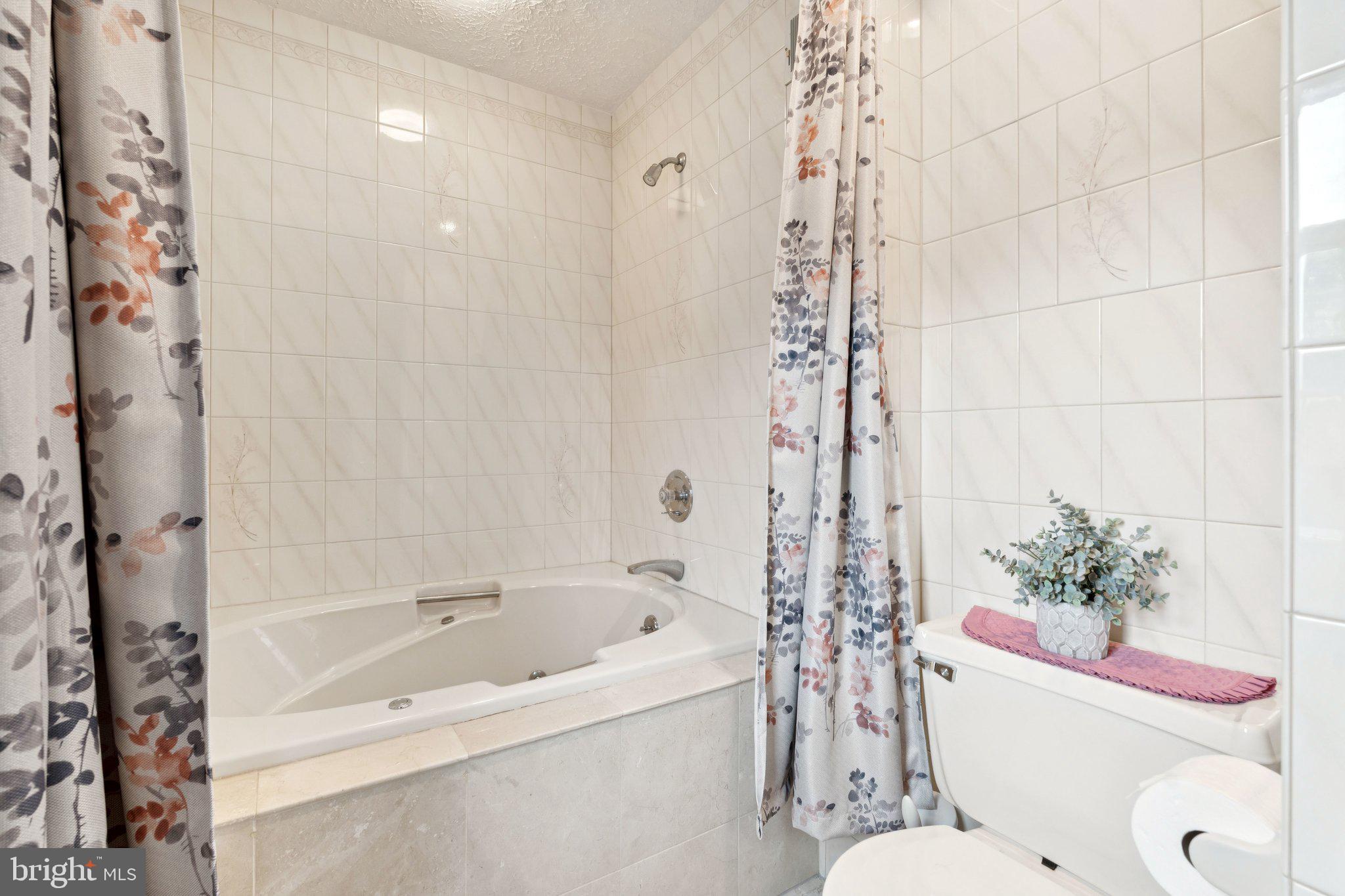 817 Peppard Drive Bel Air, MD 21014 - Photo 37 of 49 a bath room with a toilet and a bathtub