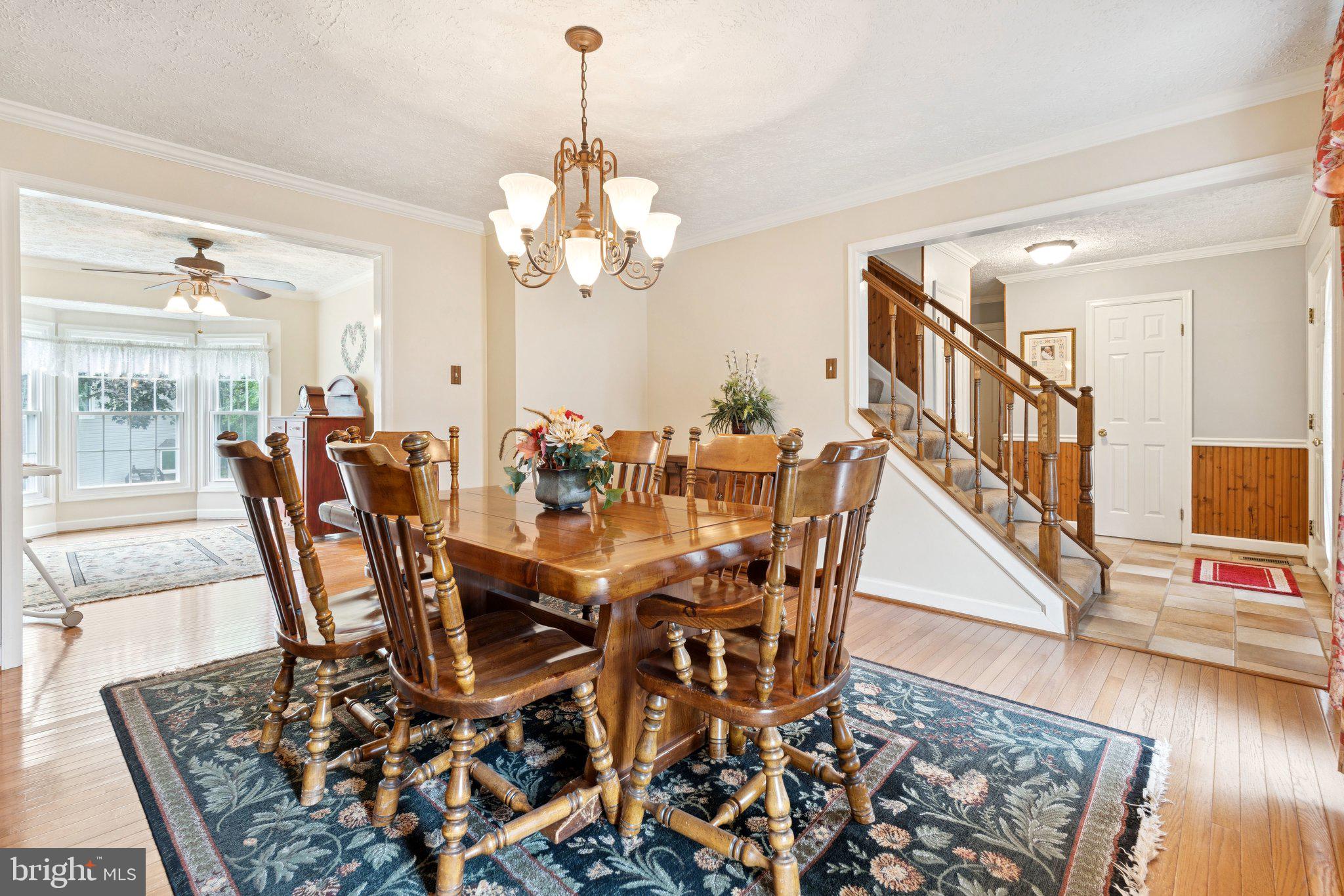 817 Peppard Drive Bel Air, MD 21014 - Photo 4 of 49 a view of a dining room with furniture wooden floor and chandelier