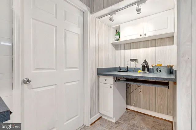a storage room with washer and dryer