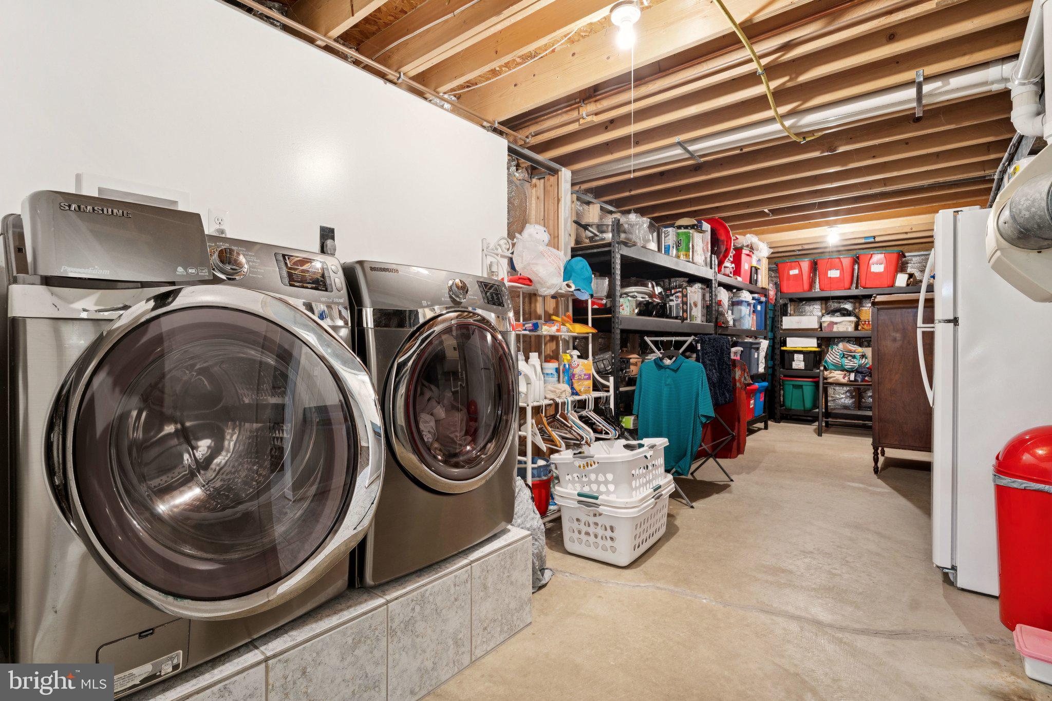 817 Peppard Drive Bel Air, MD 21014 - Photo 45 of 49 a storage room with washer and dryer