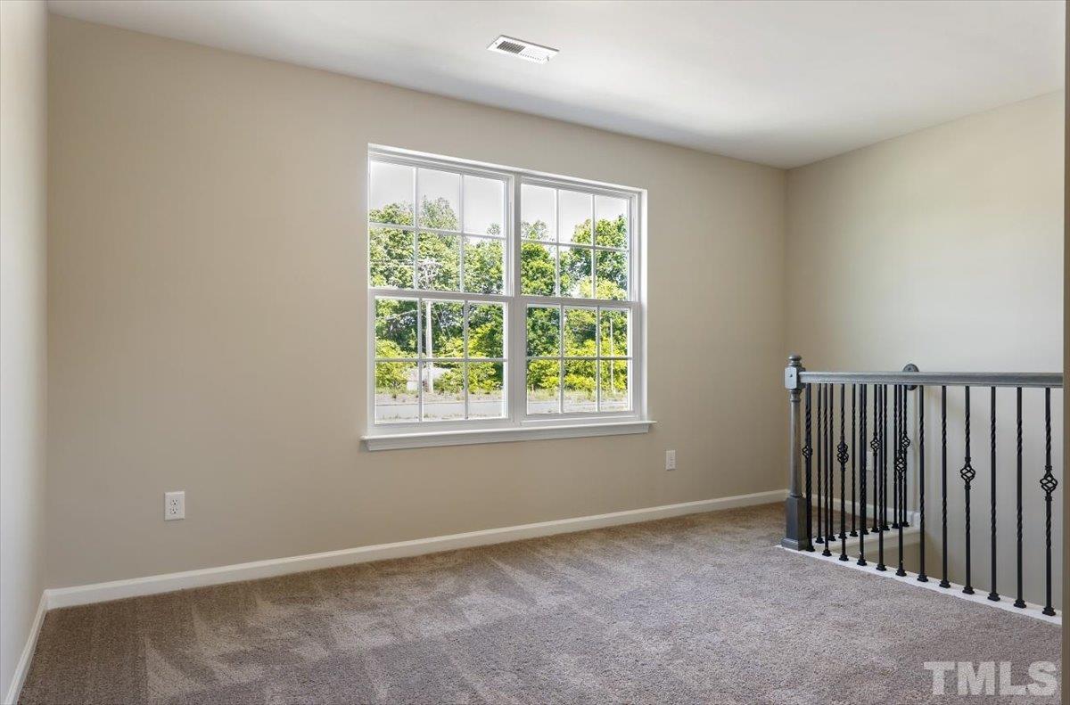 2215 Campbell Loop, Unit 49 Burlington, NC 27215 - Photo 19 of 48 a view of an empty room with a window