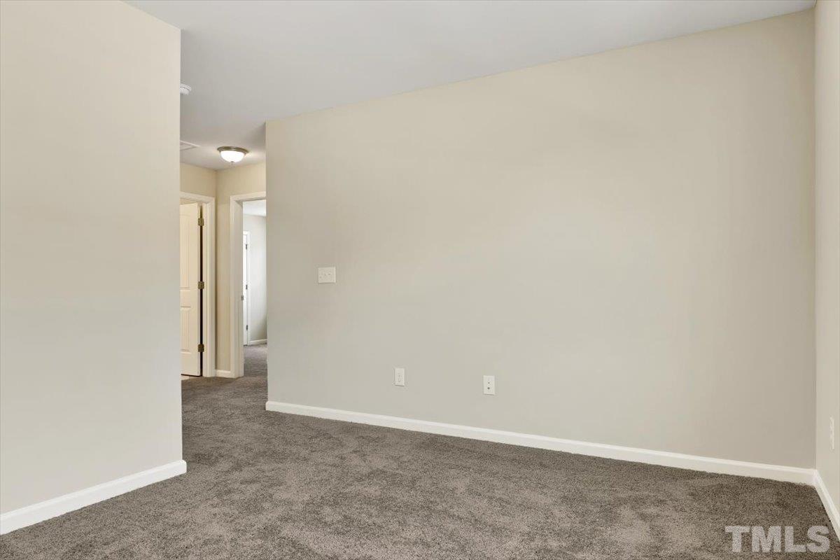 2215 Campbell Loop, Unit 49 Burlington, NC 27215 - Photo 22 of 48 an empty room with a bathroom