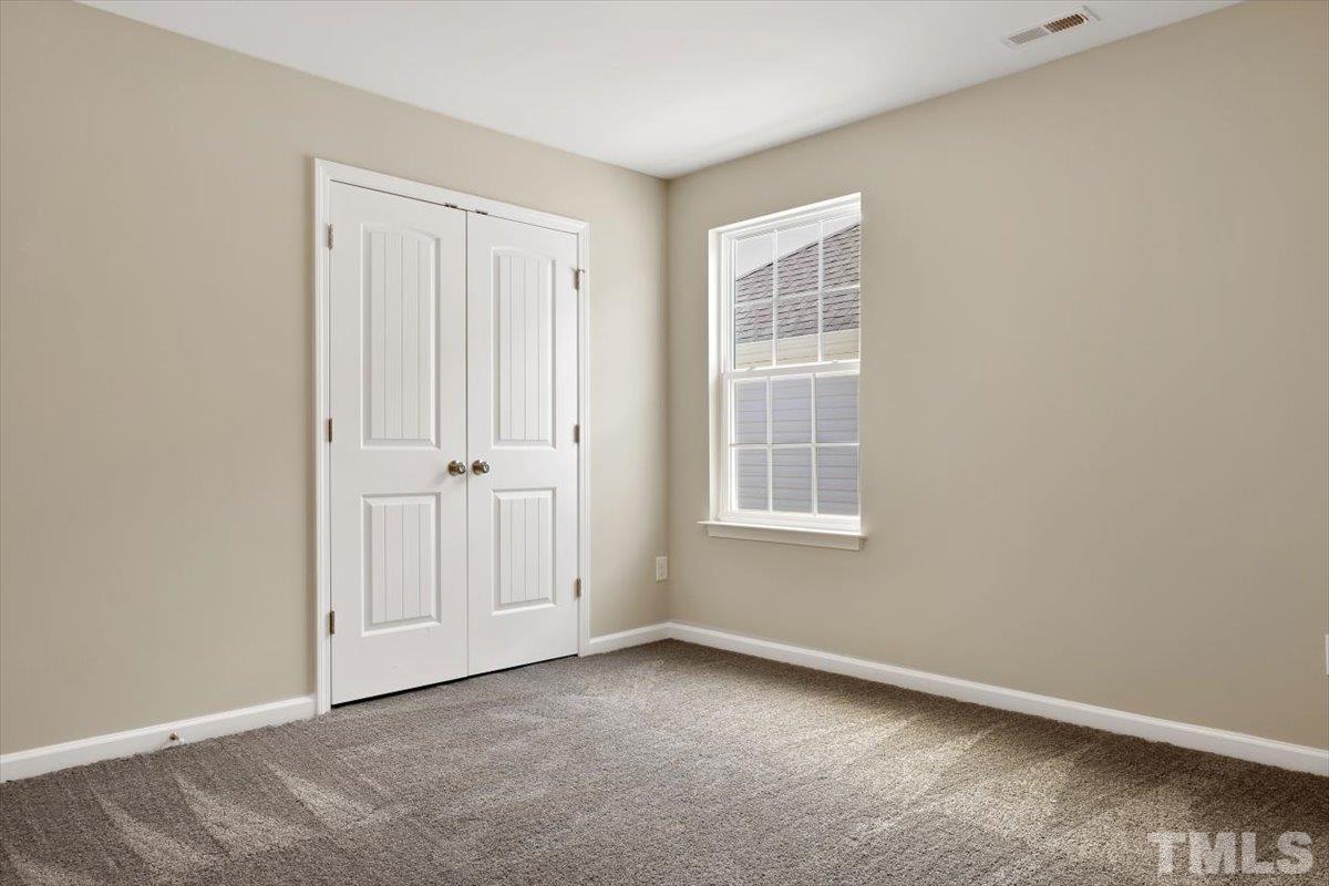 2215 Campbell Loop, Unit 49 Burlington, NC 27215 - Photo 24 of 48 an empty room with windows