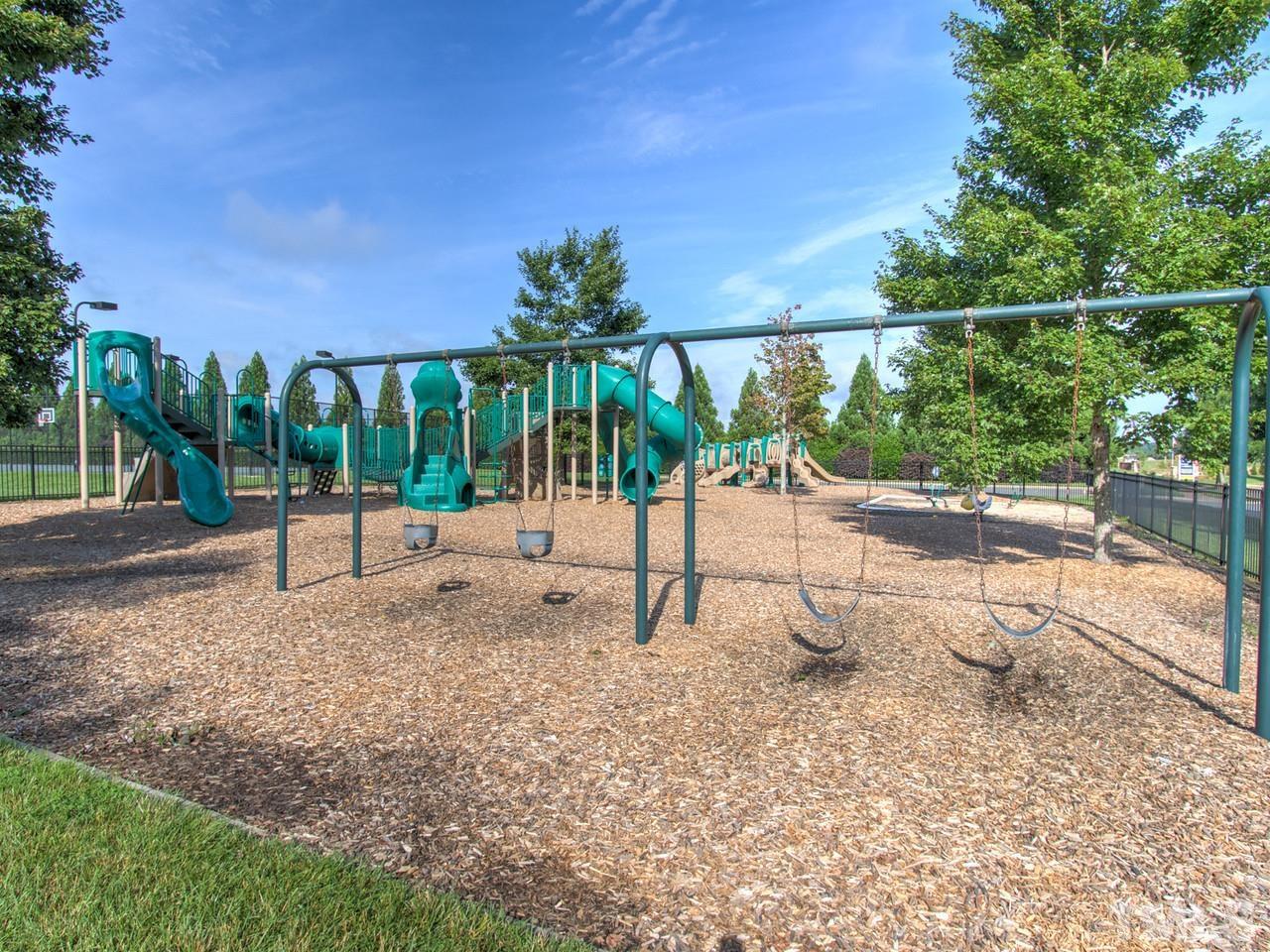 2215 Campbell Loop, Unit 49 Burlington, NC 27215 - Photo 45 of 48 a view of a park with swings