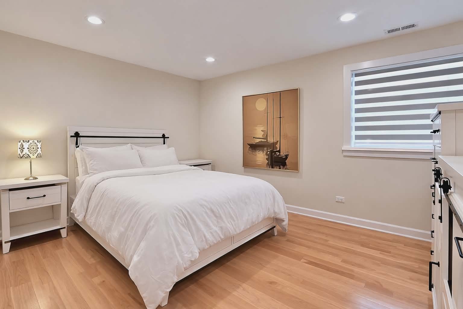 3045 North Paris Avenue, Unit 203 River Grove, IL 60171 - Photo 13 of 27 a bedroom with a bed and window