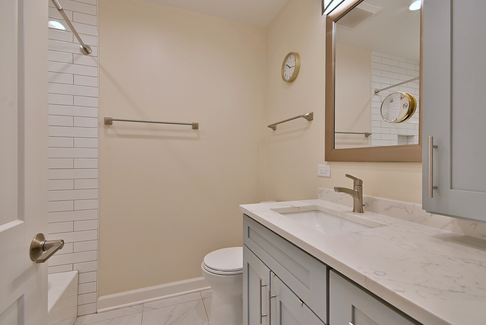 3045 North Paris Avenue, Unit 203 River Grove, IL 60171 - Photo 18 of 27 a bathroom with a sink a toilet and shower