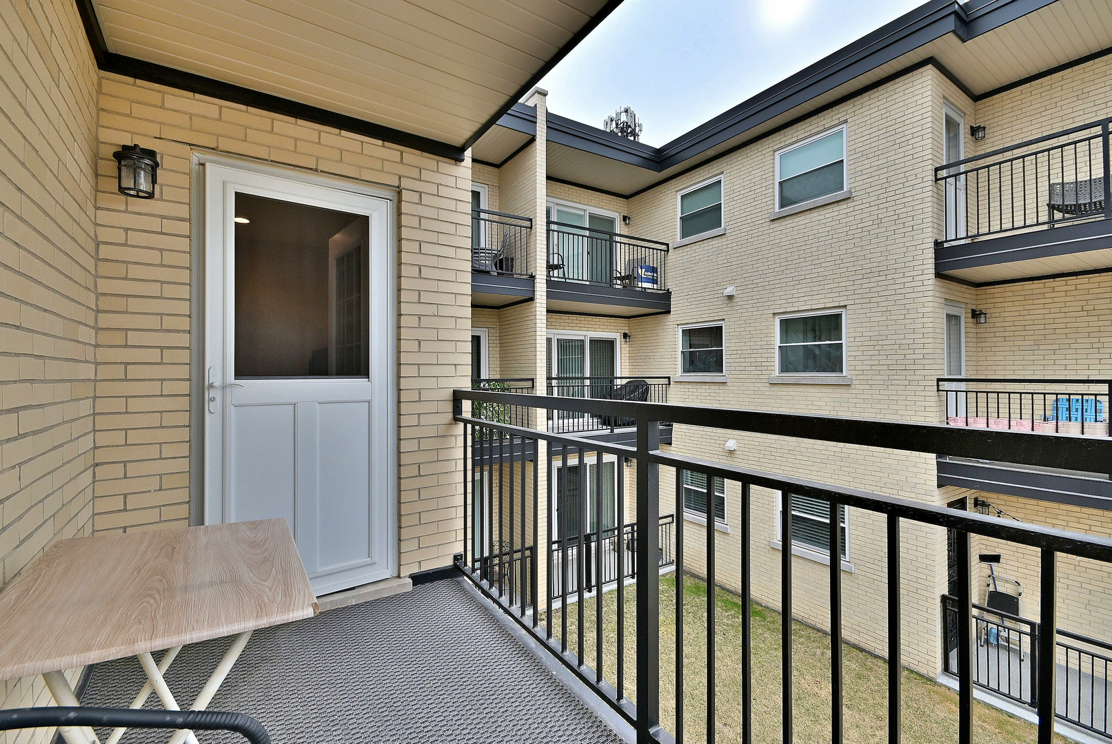 3045 North Paris Avenue, Unit 203 River Grove, IL 60171 - Photo 21 of 27 a view of a balcony with chairs