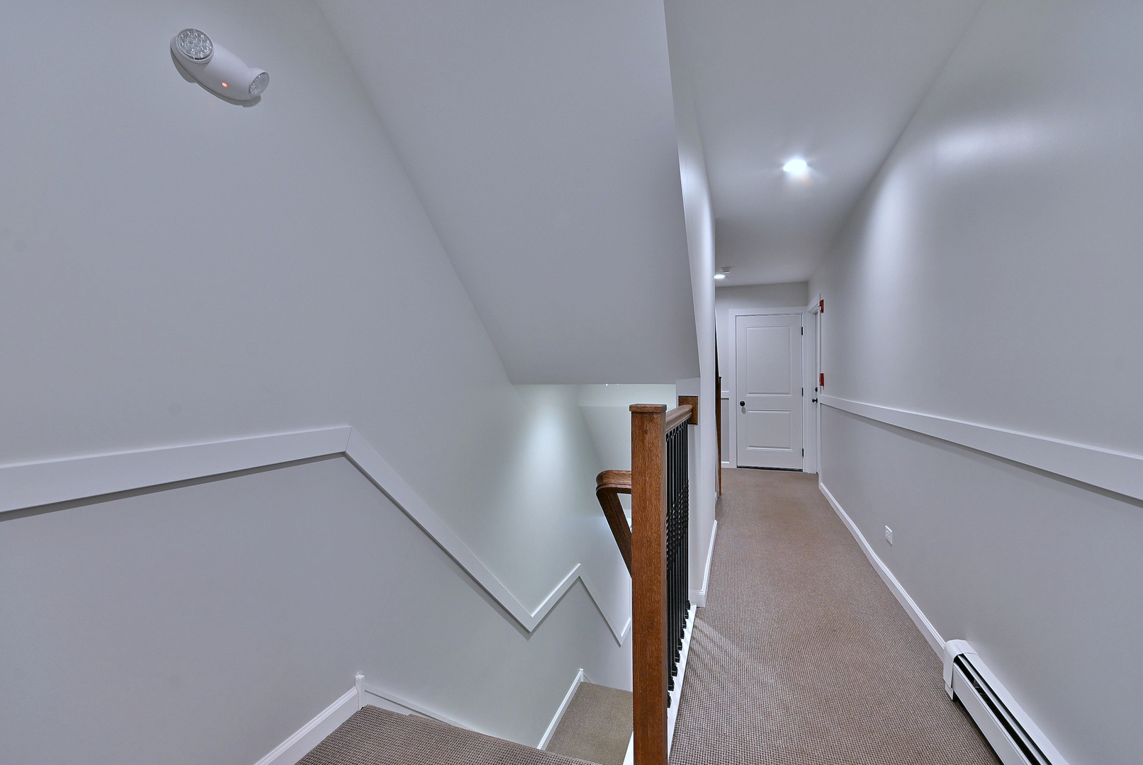 3045 North Paris Avenue, Unit 203 River Grove, IL 60171 - Photo 23 of 27 a view of a hallway with stairs