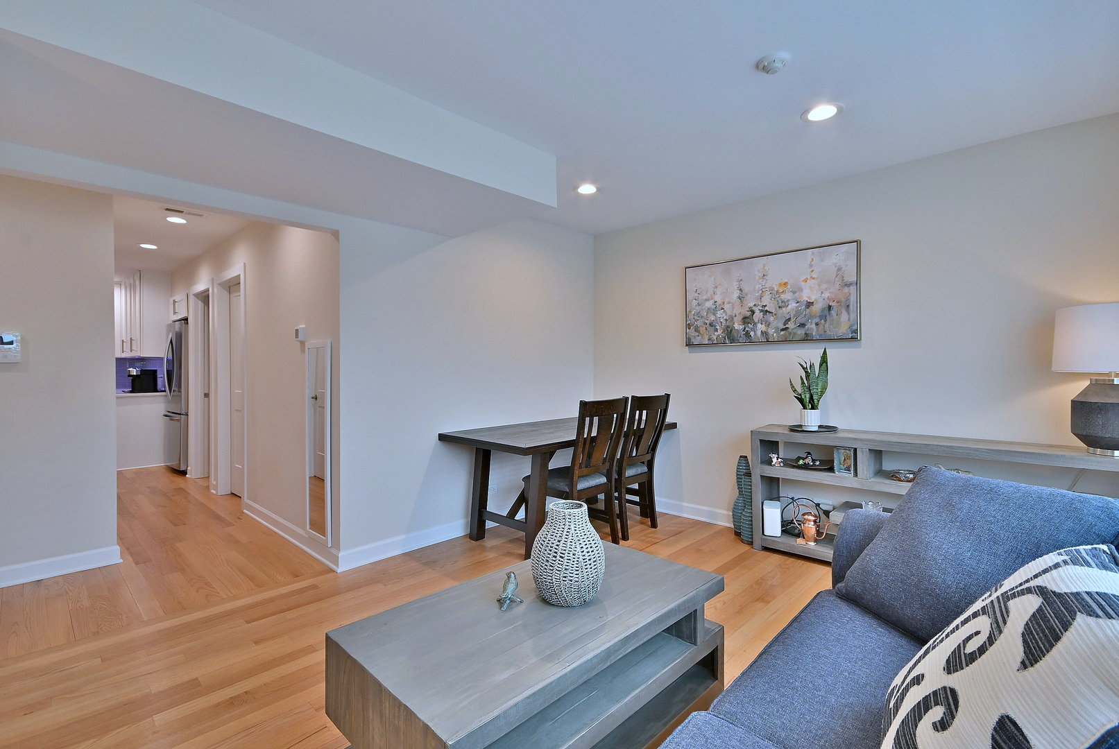 3045 North Paris Avenue, Unit 203 River Grove, IL 60171 - Photo 6 of 27 a living room with furniture and a table