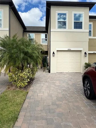 a view of a house with a garage
