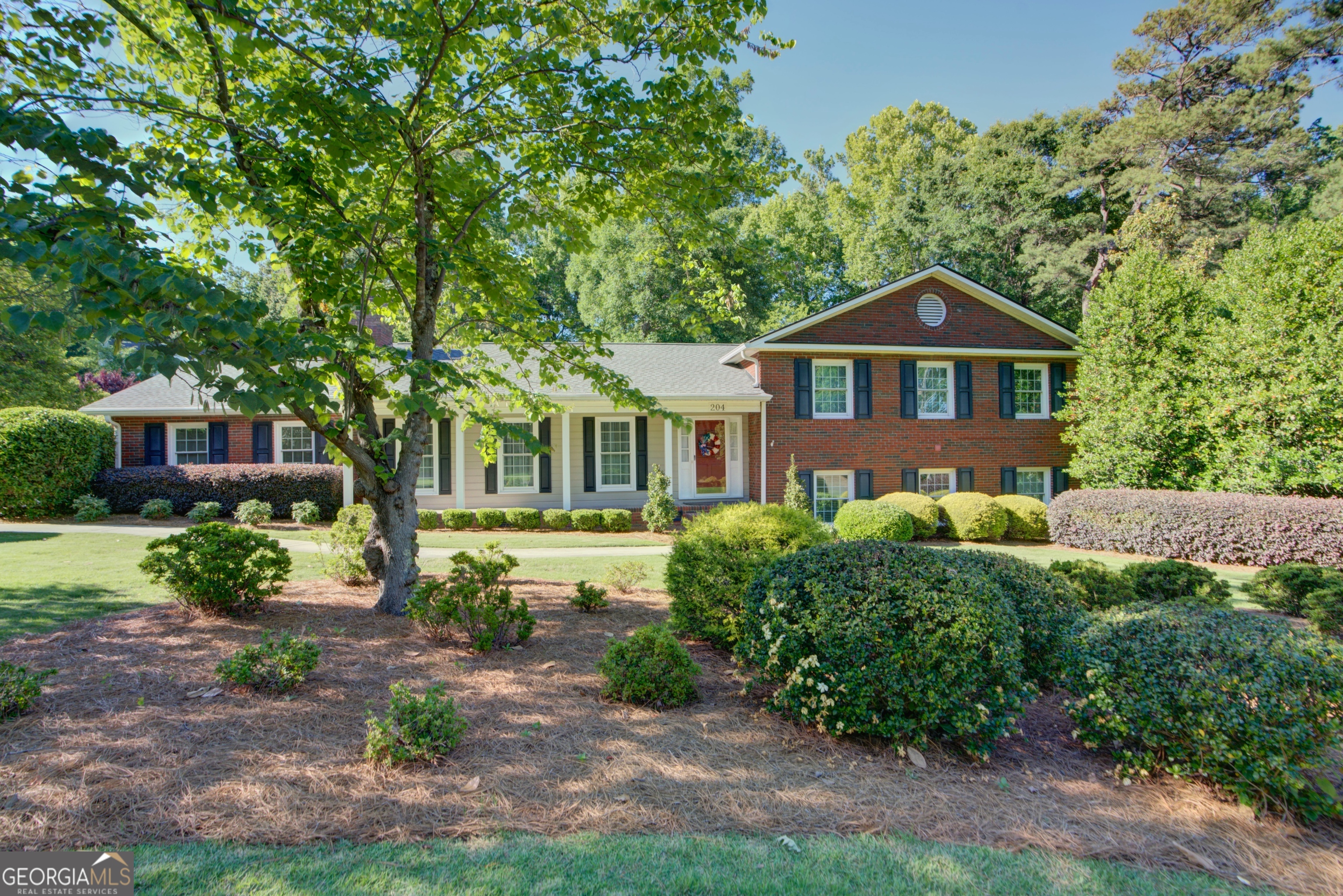 204 Green View Road Southwest Rome, GA 30165 - Photo 19 of 62 a front view of a house with a yard