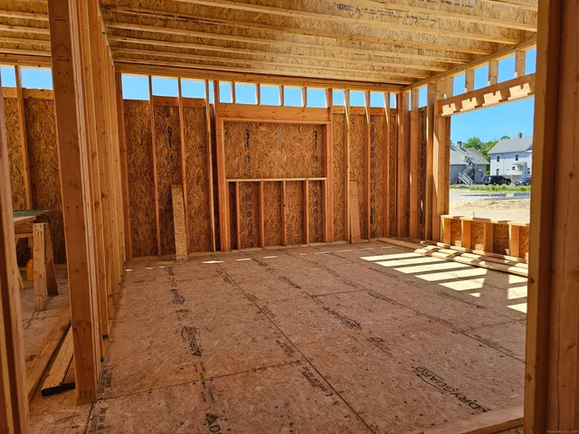 a view of a porch with a wooden fence
