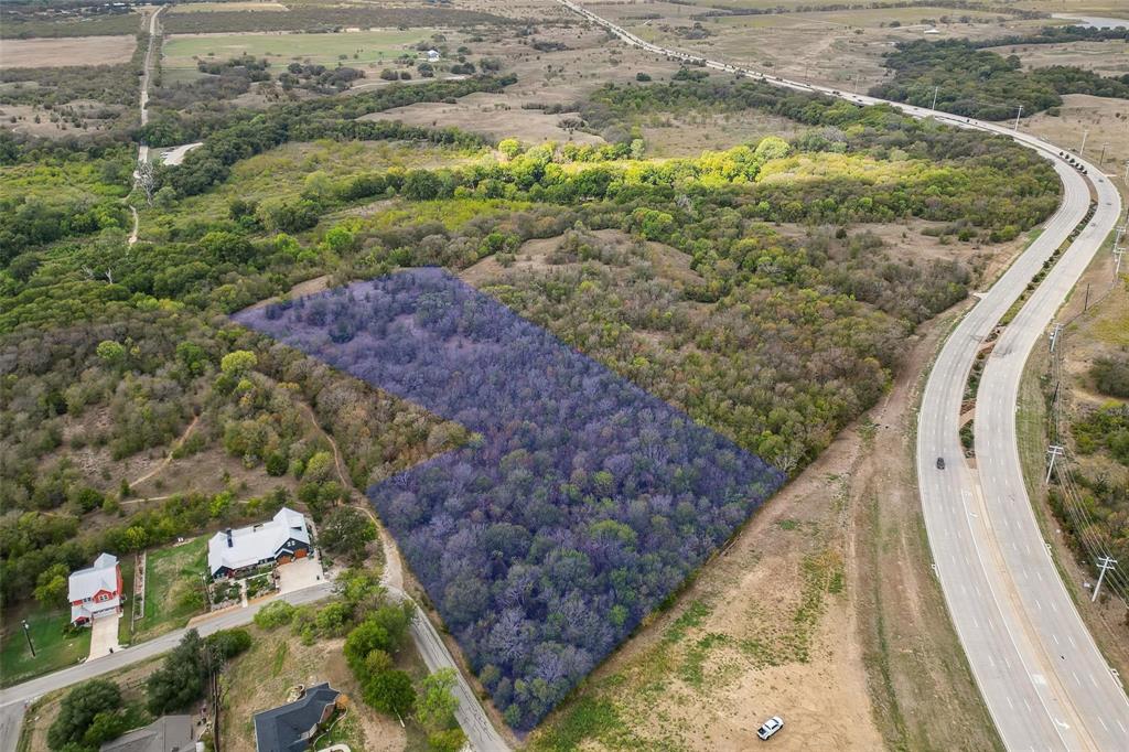 Tbd Tbd Fm1171 Roanoke, TX 76262 - Photo 4 of 36 a view of a yard with wooden fence