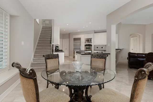 a view of a dining room with furniture