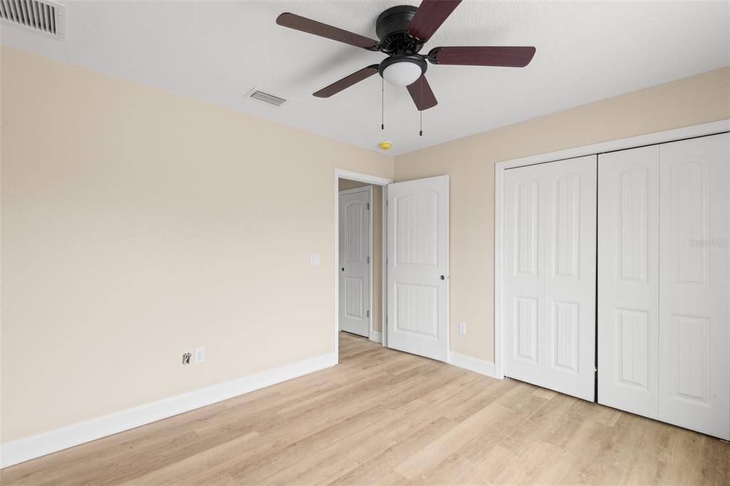 5441 Chestnut Ridge Road Dade City, FL 33523 - Photo 19 of 23 a view of an empty room
