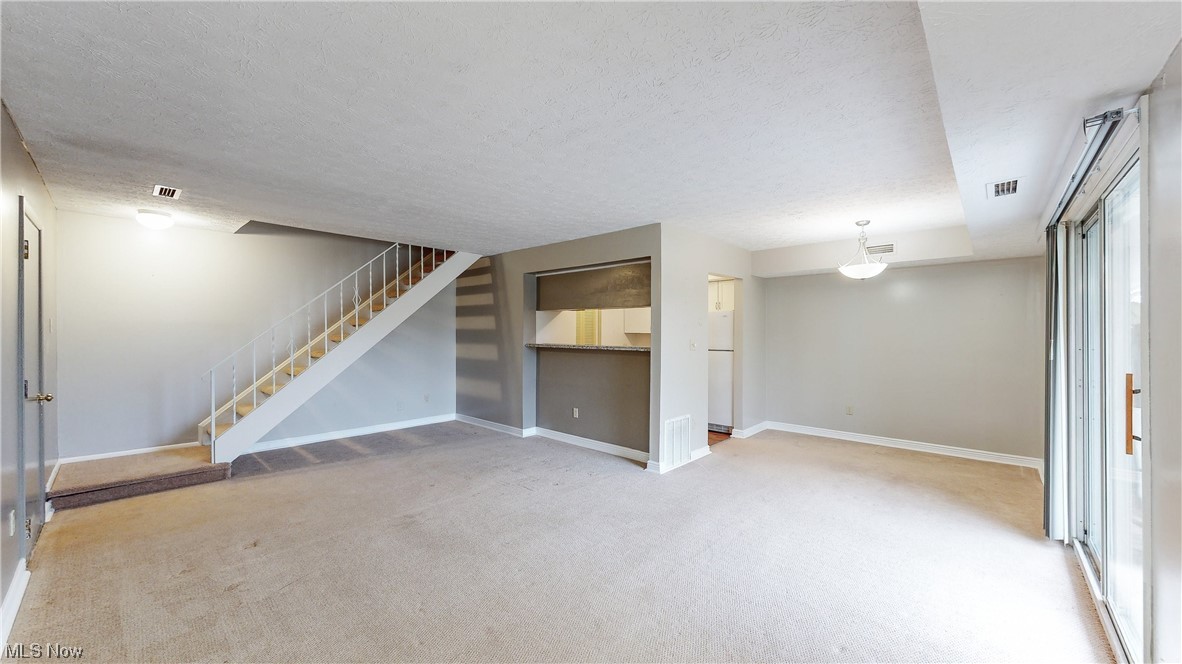 4916 Friar Road, Unit A Stow, OH 44224 - Photo 5 of 39 Entry into Living Room