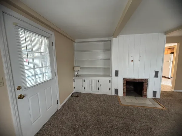 a kitchen with stainless steel appliances granite countertop a sink and a stove