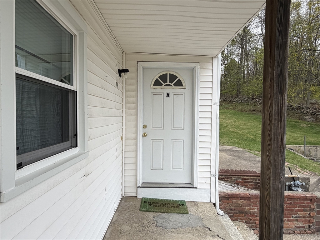 79 North Main Street, Unit A Bellingham, MA 02019 - Photo 4 of 22 a view of front door