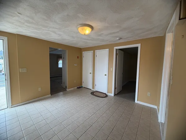 a kitchen with stainless steel appliances granite countertop a sink and a stove