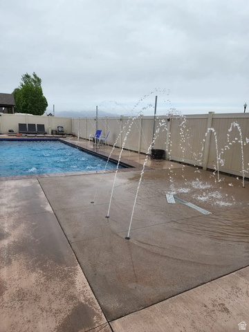552 Sunset Crest Way Draper, UT 84020 - Photo 64 of 68 View of pool featuring a fenced backyard