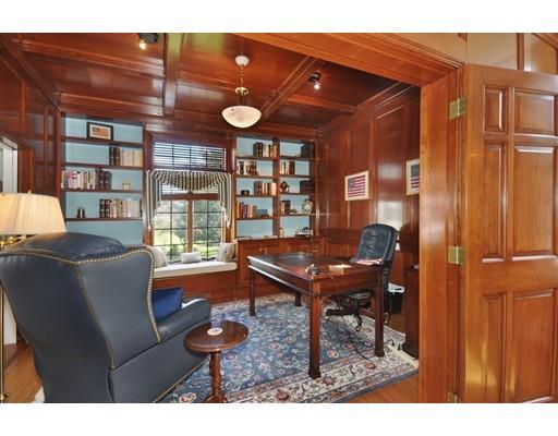 336 Lexington Road Concord, MA 01742 - Photo 13 of 29 a living room with furniture a bookshelf and a window